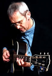 Jon Moore playing a Gibson King Electro guitar